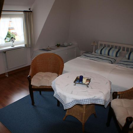 Ferienwohnungen Im Hotel Garni Zur Post Utersum Quarto foto