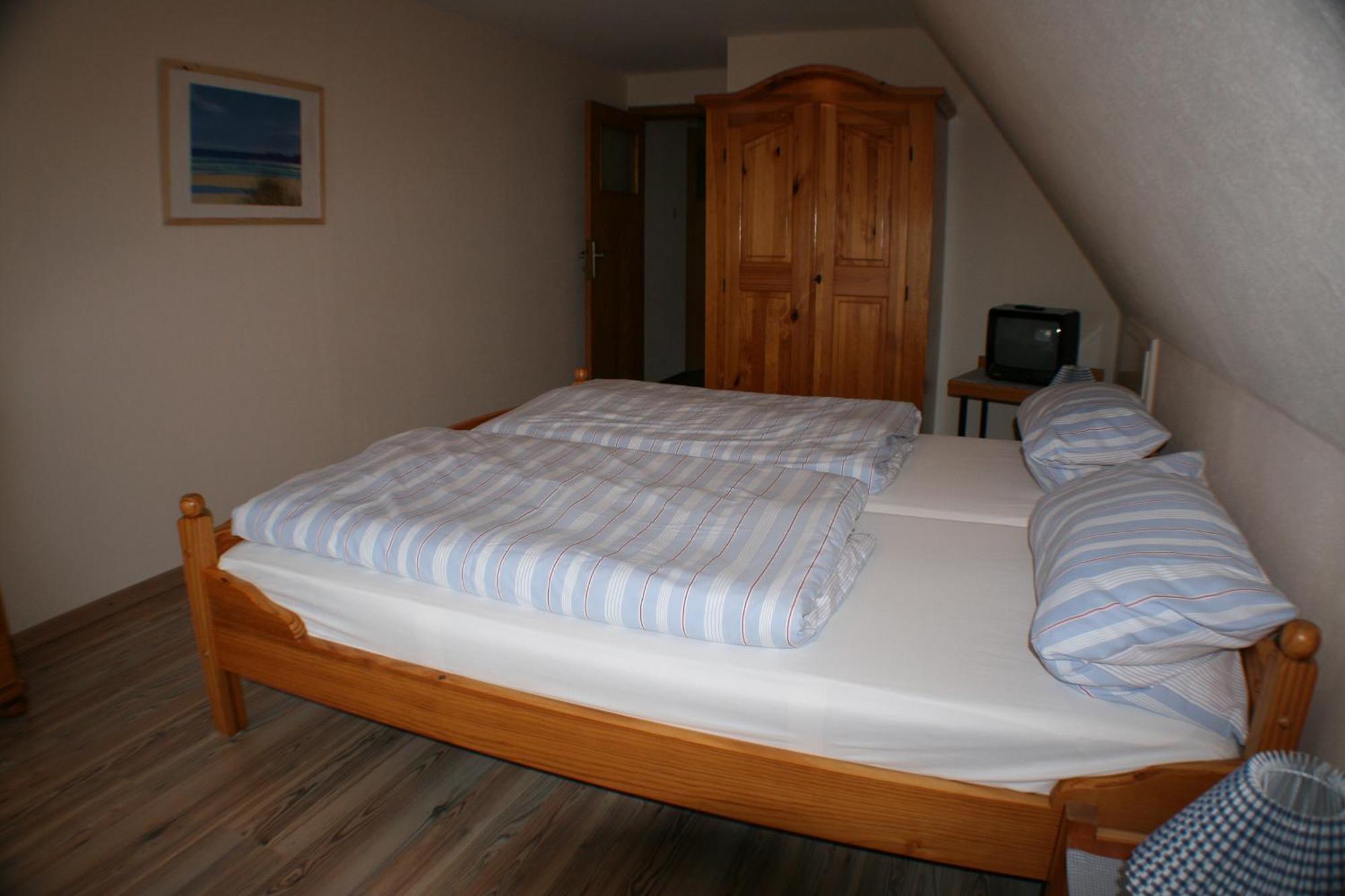 Ferienwohnungen Im Hotel Garni Zur Post Utersum Quarto foto