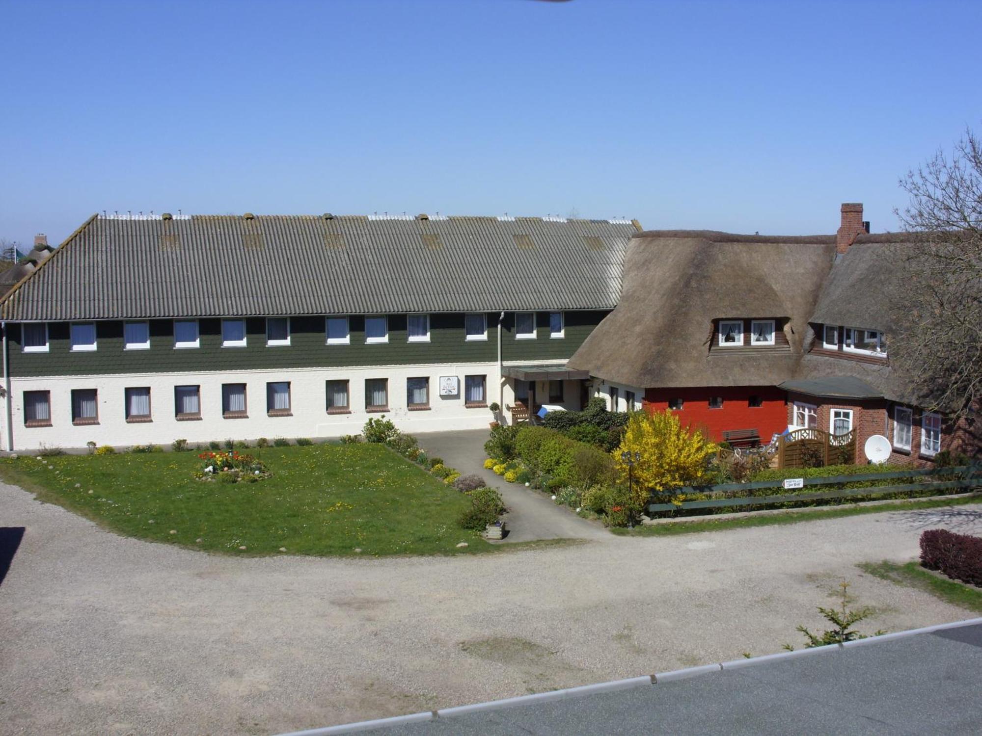 Ferienwohnungen Im Hotel Garni Zur Post Utersum Quarto foto