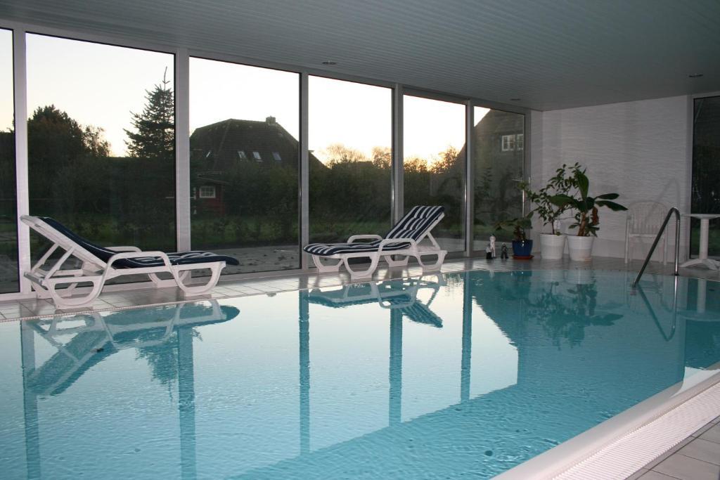 Ferienwohnungen Im Hotel Garni Zur Post Utersum Quarto foto